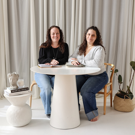 Sandy & Megan photo in an office